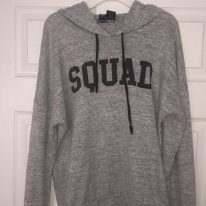 Sweatshirt with “squad” across it.